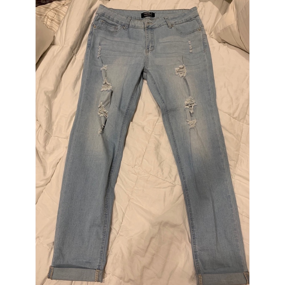 Light washed jeans with rips